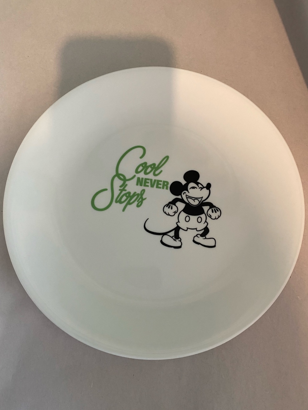 Corelle Disney White Plate with Black Character and Green Script